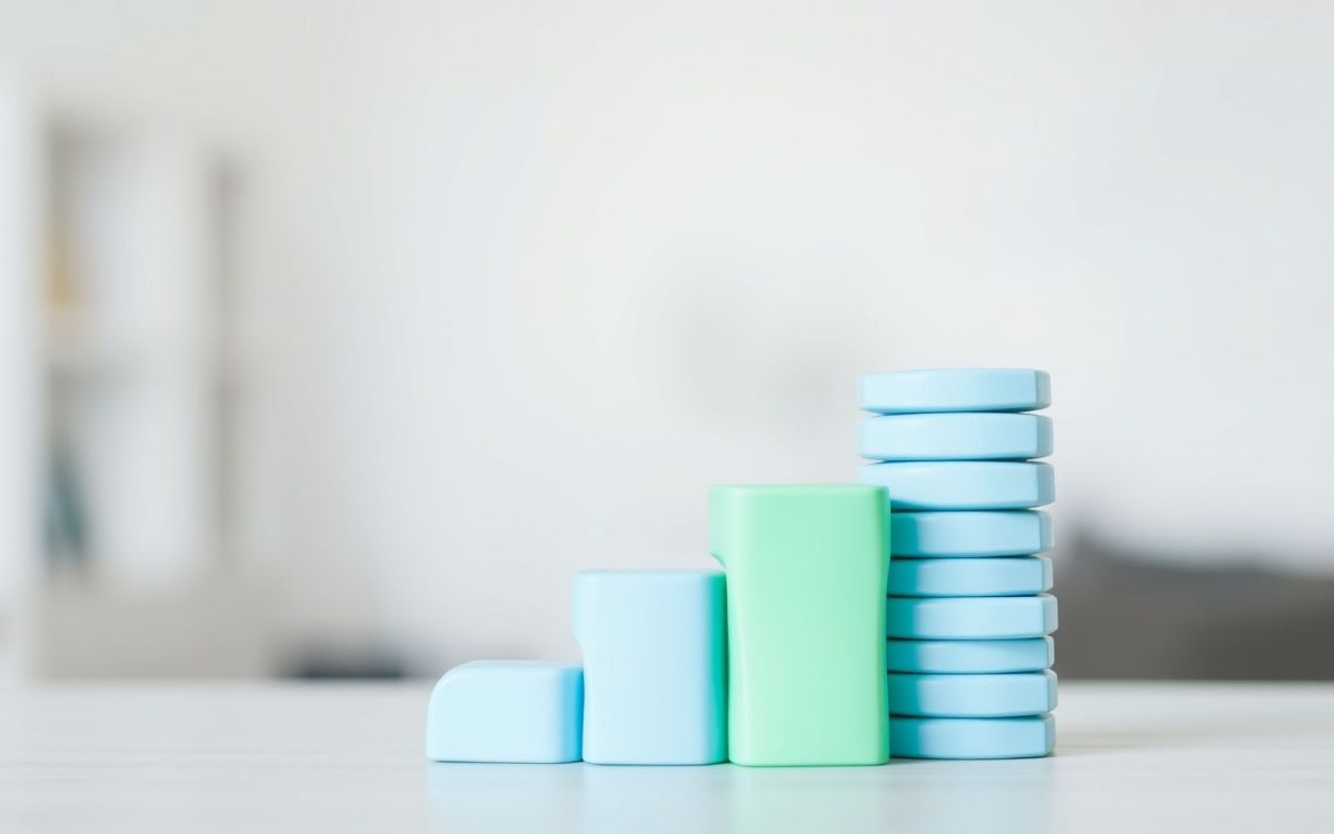 Abstract representation of how real estate crowdfunding works using softly blurred, stacked shapes symbolizing growth and investment.