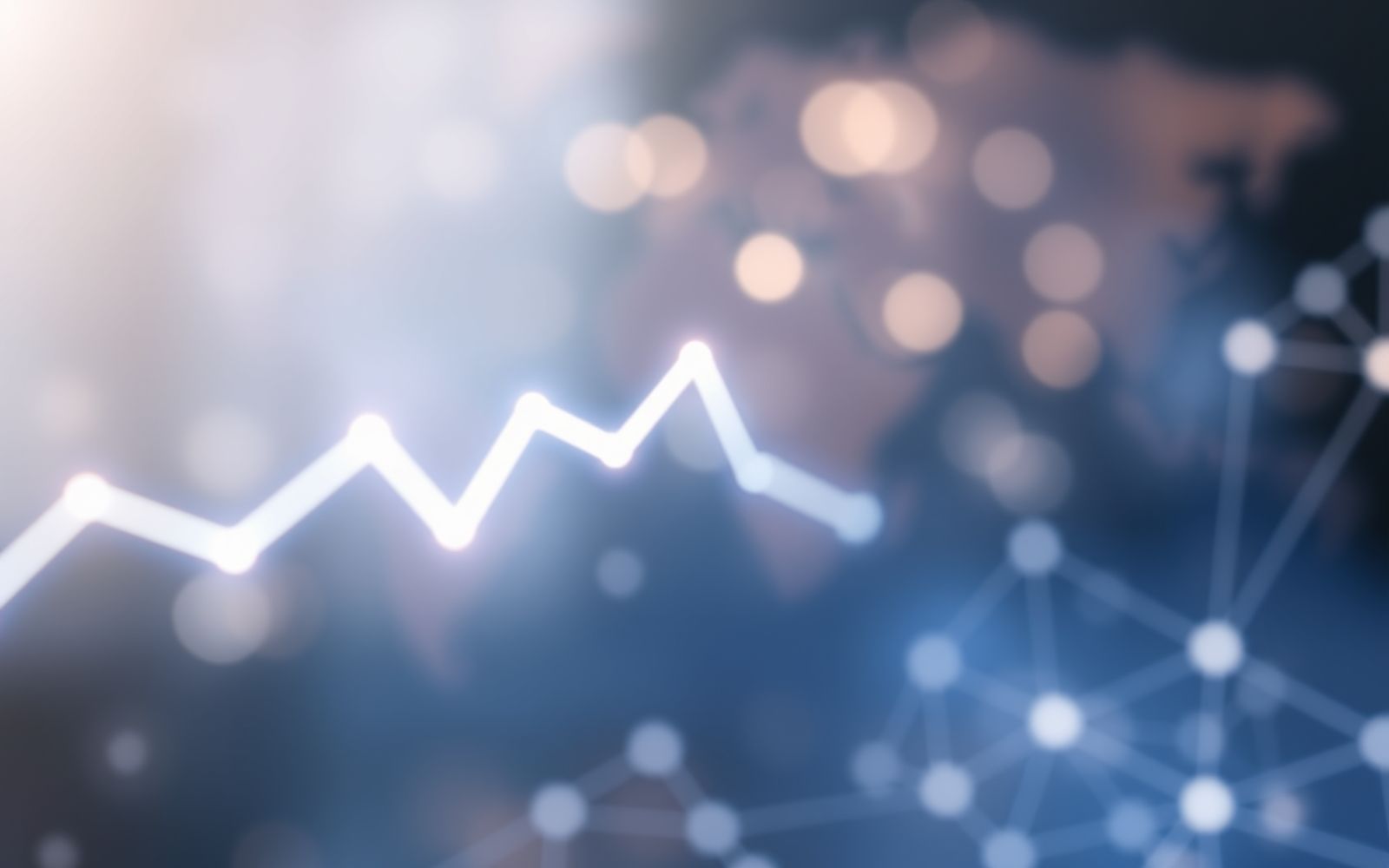 Abstract representation of macroeconomics basics showing positive growth trends with soft focus.